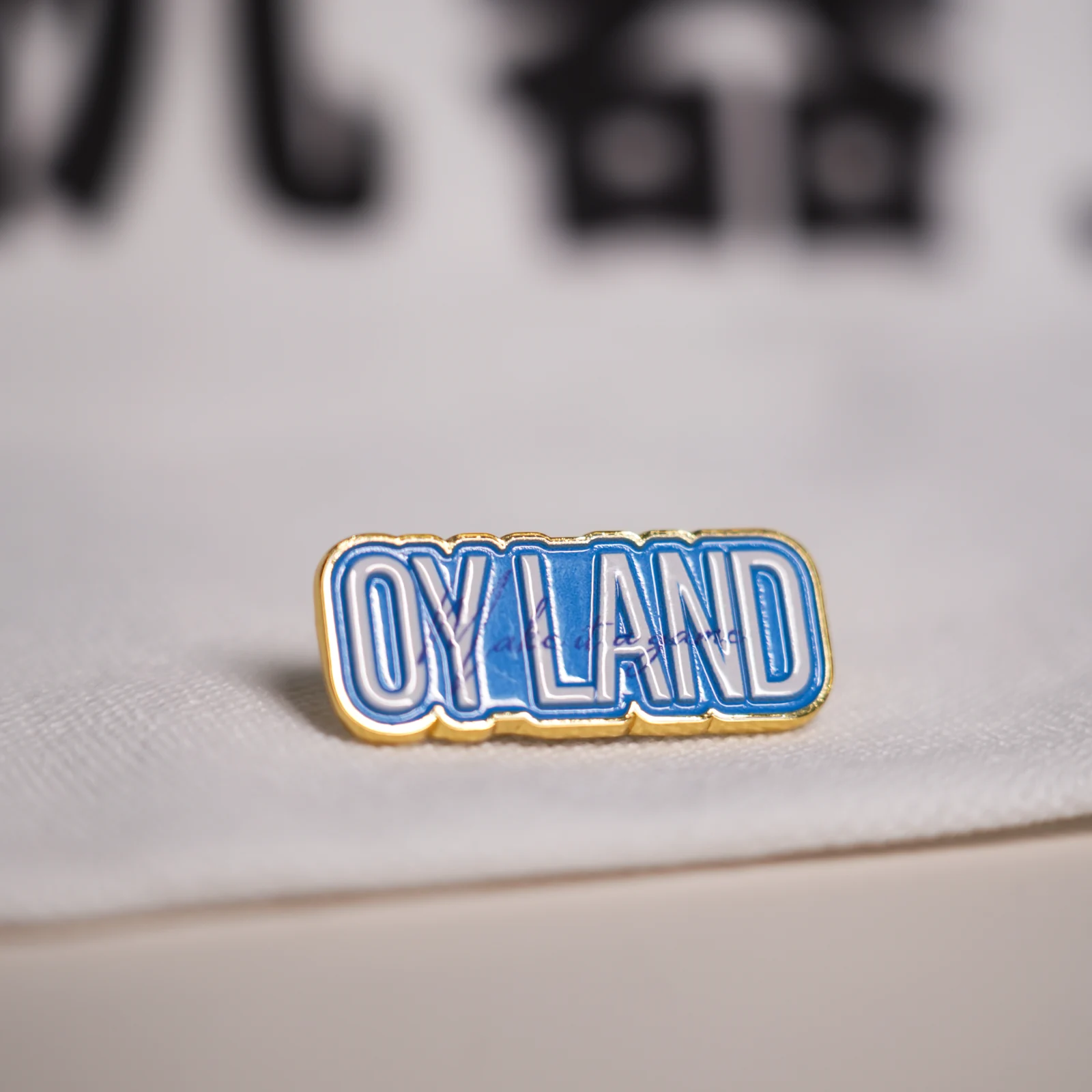 OY LAND 徽章